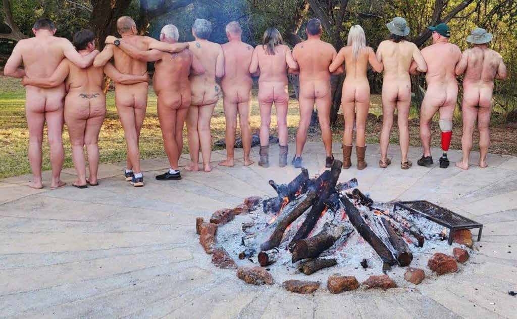 NWNA members around the bonfire at Kiepersolkloof – North-West Naturist Association AGM July 2023