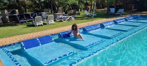 SunEden Naturist Resort pool – Joxilox Tours guest review by Hans and Carley