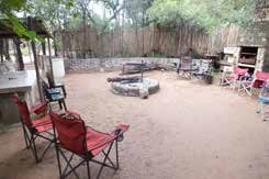 Bush setting and fire pit boma at Lauma Aurora (OUMA)