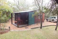 Cabin interior at Lauma Aurora (OUMA) naturist bush camp