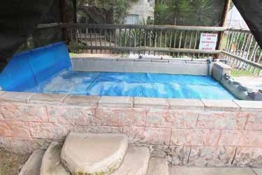 Heated indoor pool at Lauma Aurora – OUMA naturist bush camp