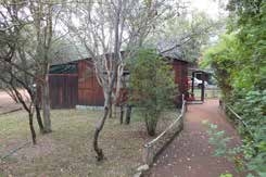 Log cabin at Lauma Aurora (OUMA) naturist bush camp