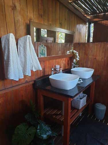 Queen bed in luxury safari tent โ Kingfisher Lakeside Retreat KZN